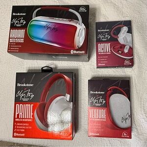 New Brookstone Prime Set of 4! Speaker, headphones, clip on speaker, earbuds!